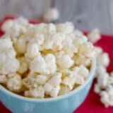 Eggnog Popcorn in a blue bowl