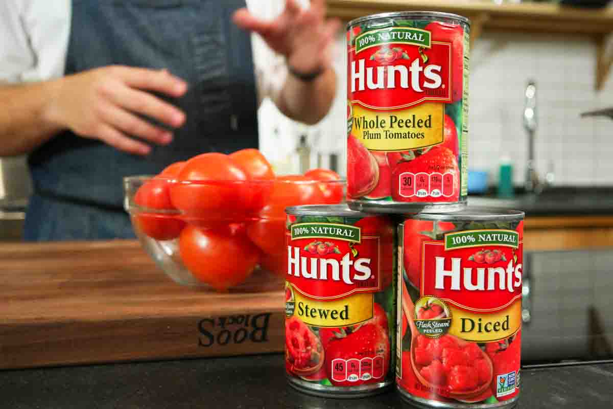 Cans of Hunt's canned tomatoes.