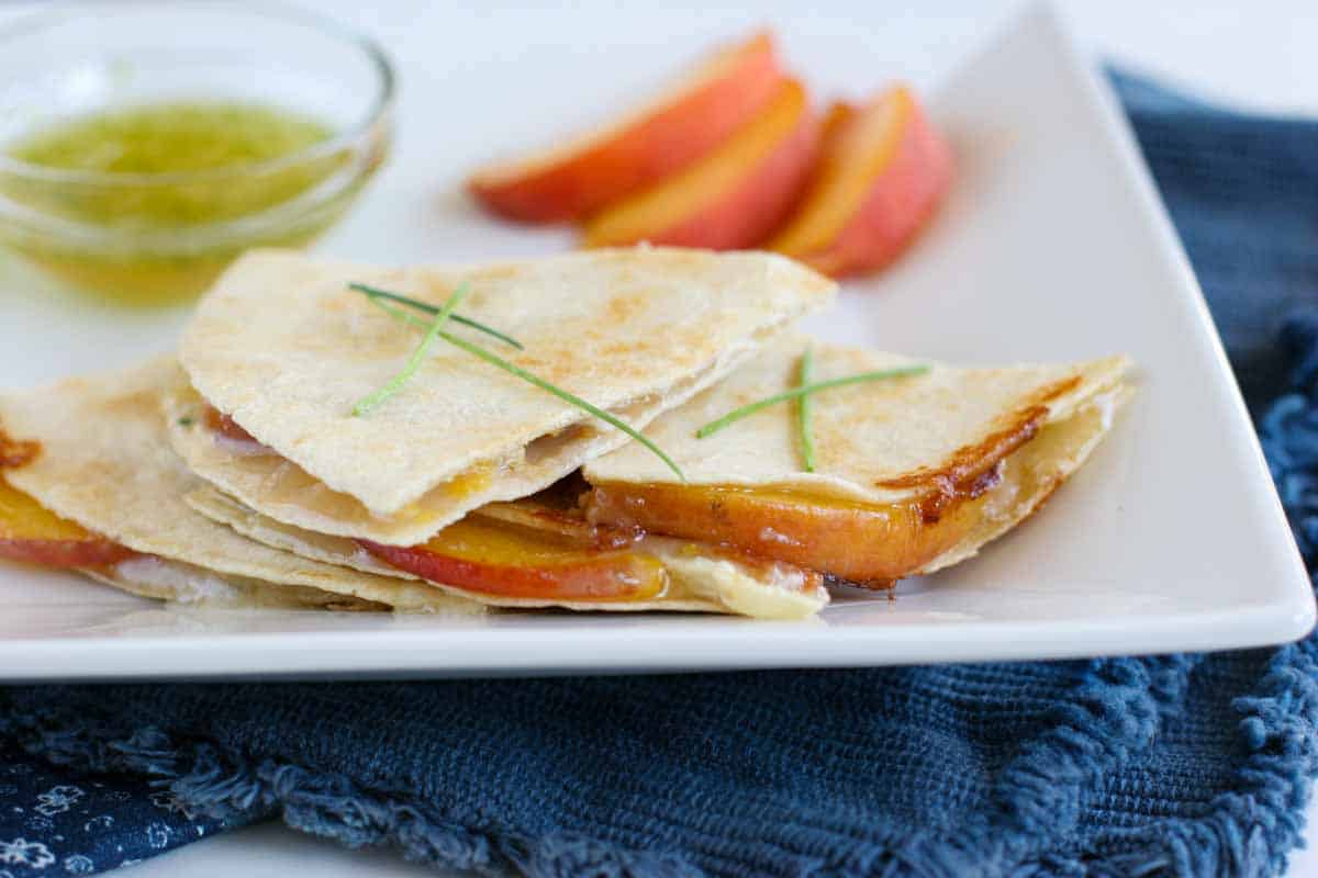 Quesadillas made with fresh peaches and brie cheese.