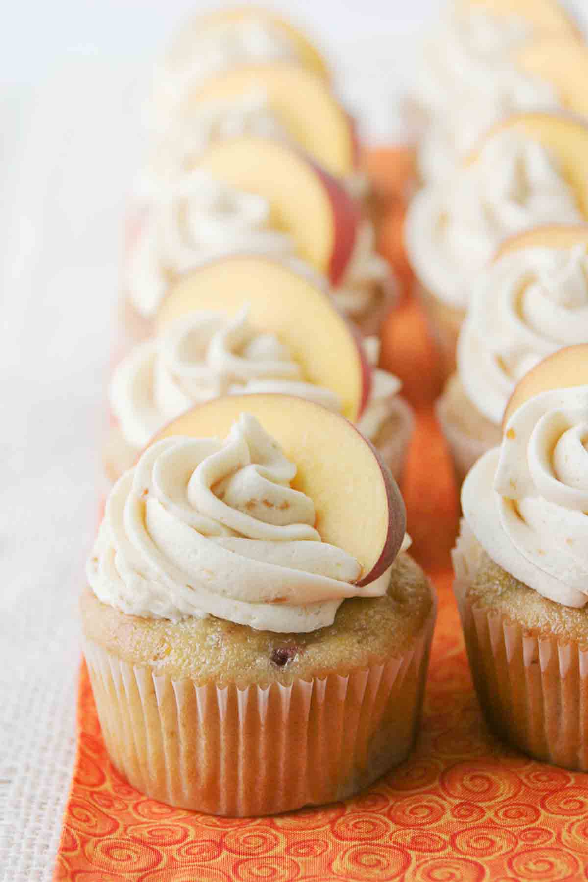 Peach Cupcakes made with fresh peaches and topped with peach buttercream