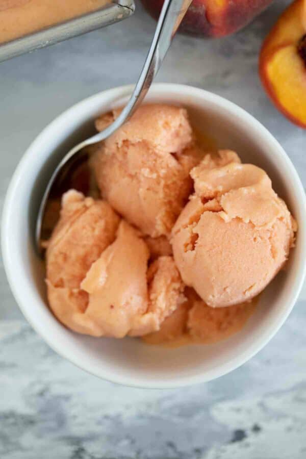 scoops of Peach Frozen Yogurt in a bowl