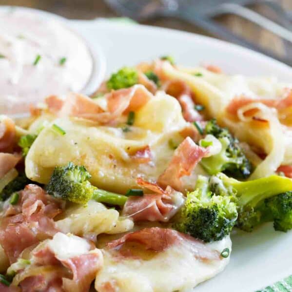 Pierogi recipe with ham and broccoli served with dipping sauce.