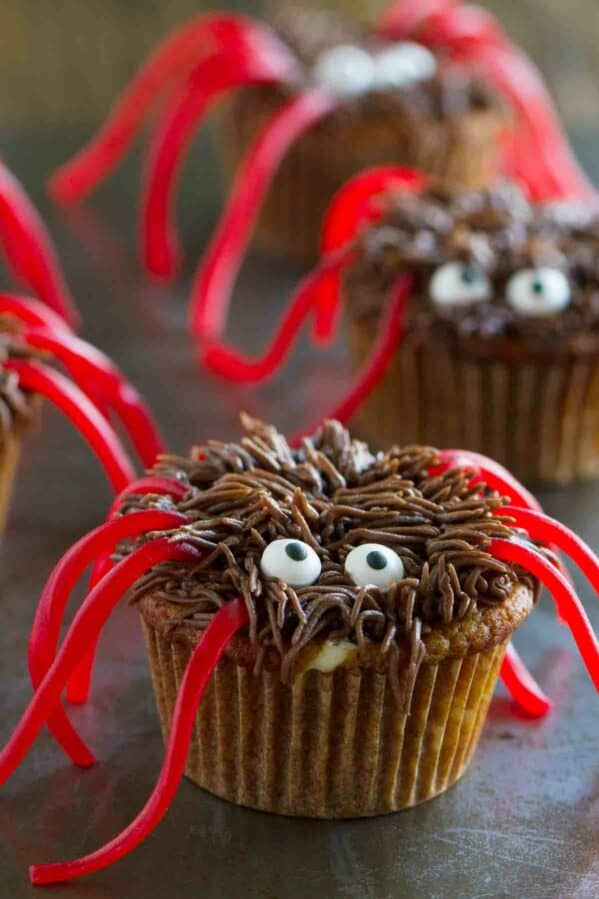 Pumpkin Cheesecake Spider Cookies on a surface.