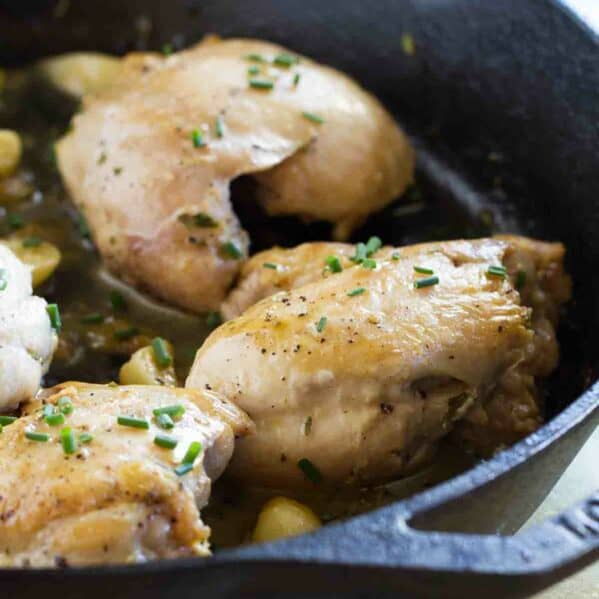 Skillet Chicken with Garlic and Herbs in a cast iron skillet.