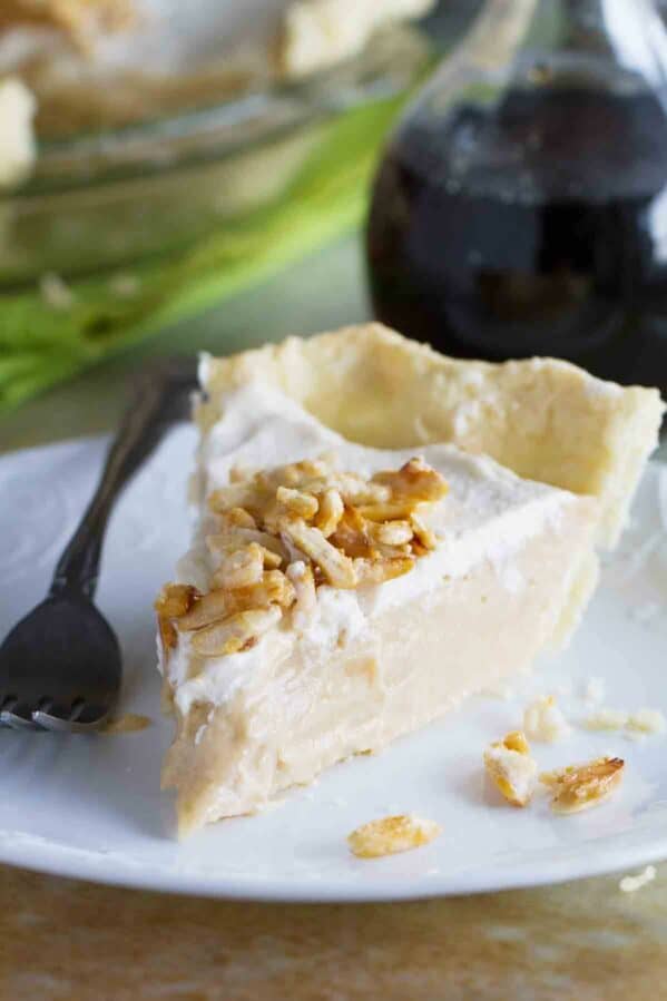 Slice of Maple Cream Pie on a plate.