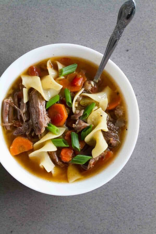 Slow Cooker Beef Noodle Soup with vegetables.