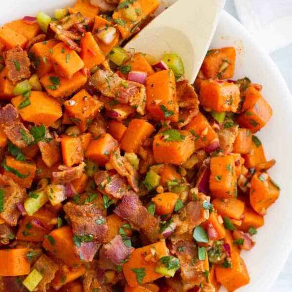 Potato salad made from sweet potatoes and bacon.