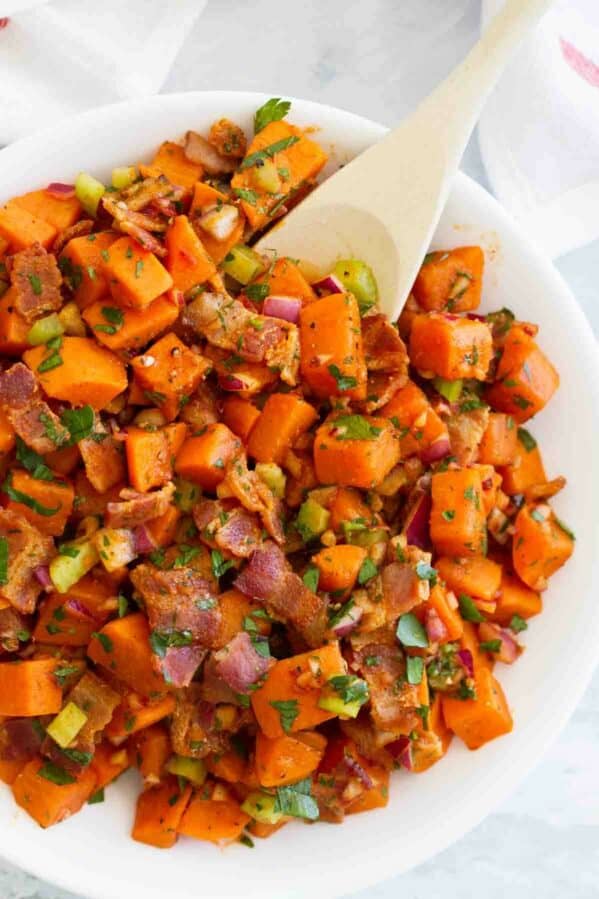 Potato salad made from sweet potatoes and bacon.