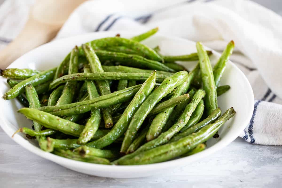 Bowl filled with air fryer green beans.