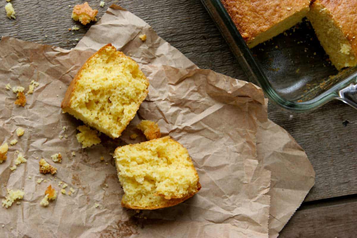 slice of boston market cornbread torn in half.