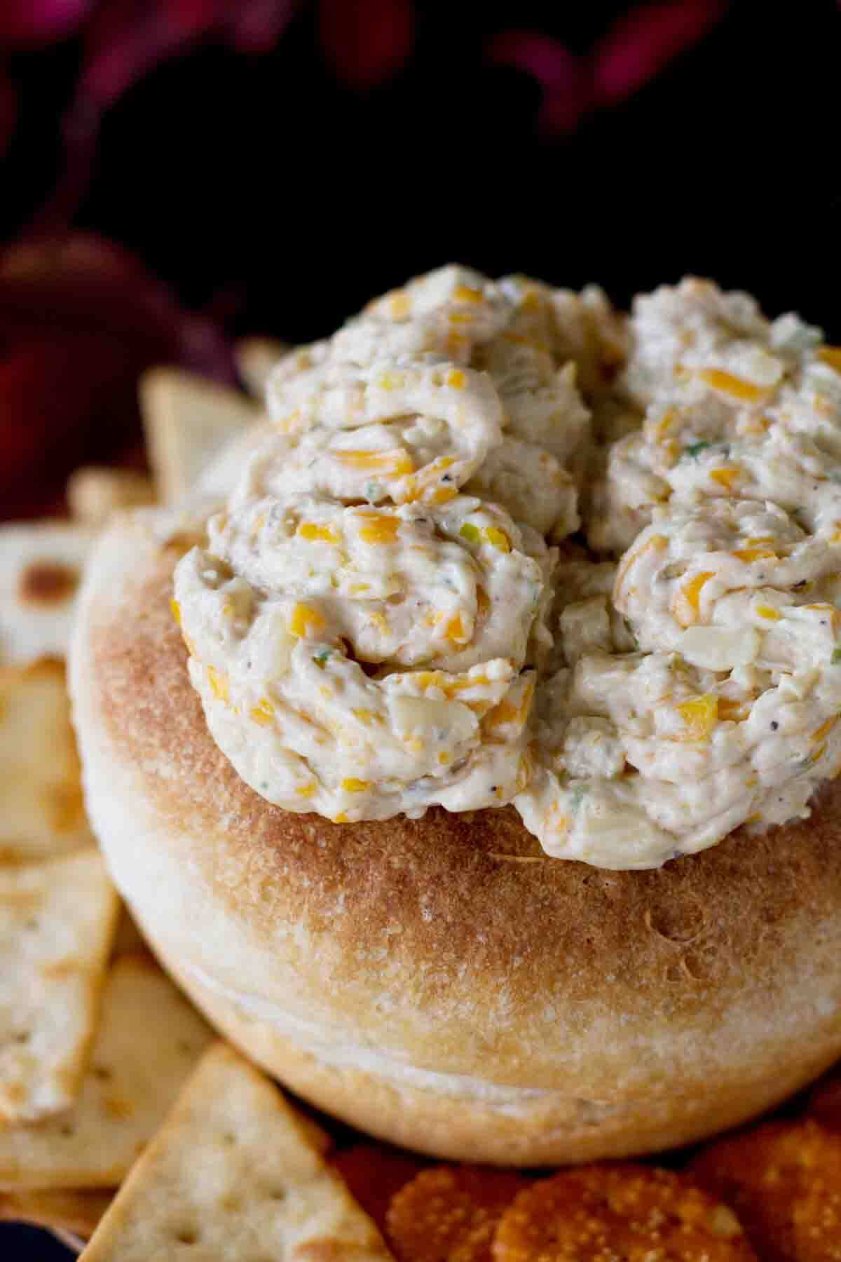 Cheese dip made to look like monster brains served in a bread bowl.