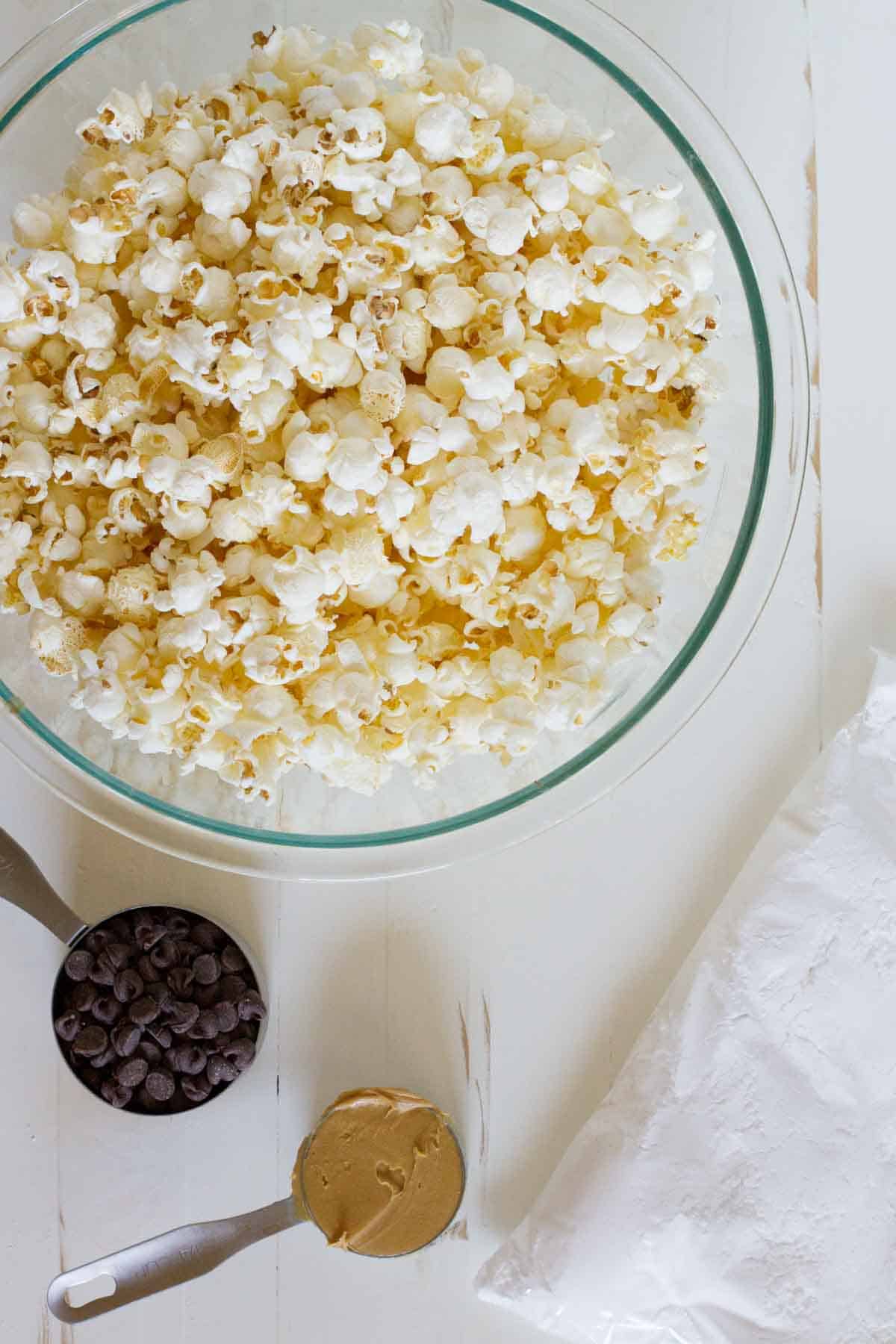 Ingredients needed for muddy buddy popcorn.