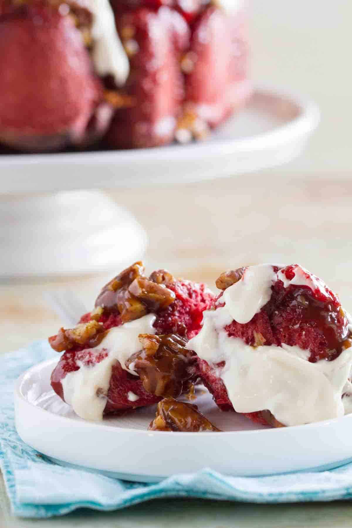 Pieces of Red Velvet Pull Apart Bread on a small plate.