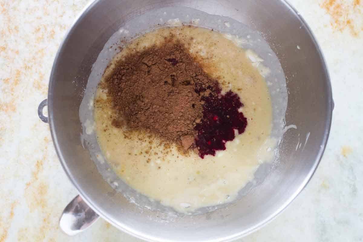 Ingredients for red velvet pull apart bread in a stand mixer bowl.