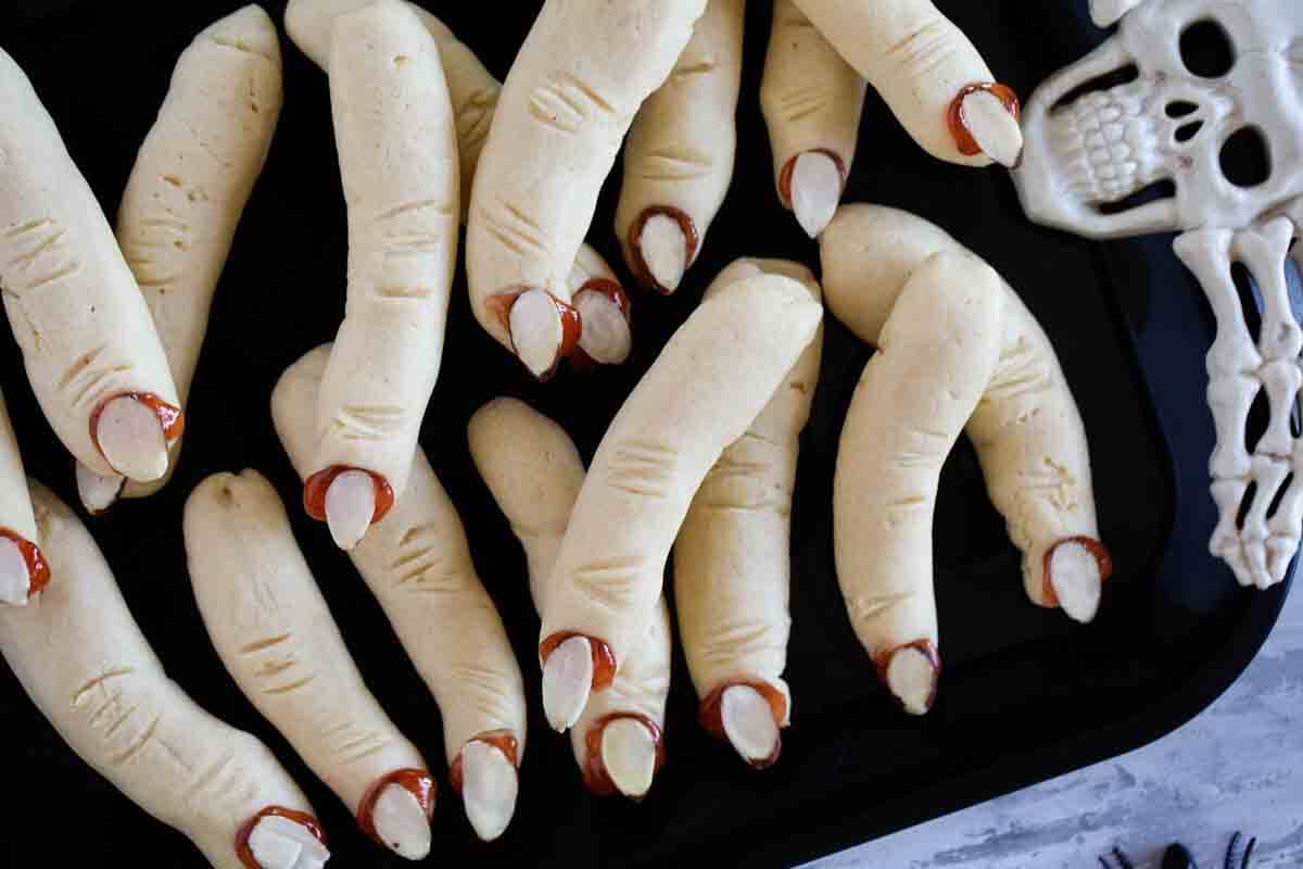 Witch Fingers - shortbread cookies shaped like fingers, topped with almonds for fingernails.