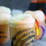 Glasses of Witches Brew - a family friendly Halloween drink with sherbet.