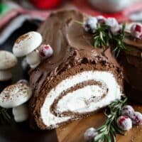 Bûche de Noël (Yule Log Cake) decorated with whipped chocolate ganache.