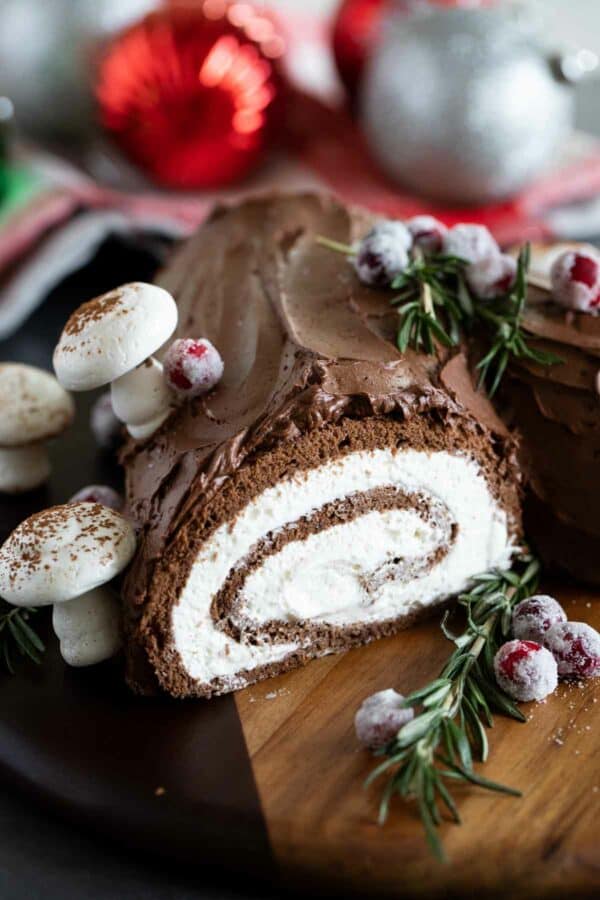 Bûche de Noël (Yule Log Cake) decorated with whipped chocolate ganache.