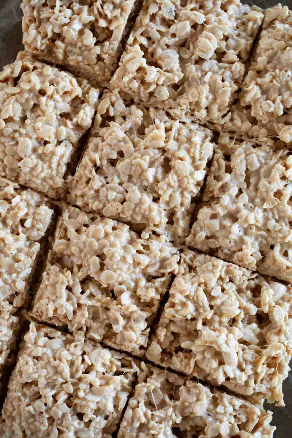 Top view of caramel rice krispie treats cut into squares