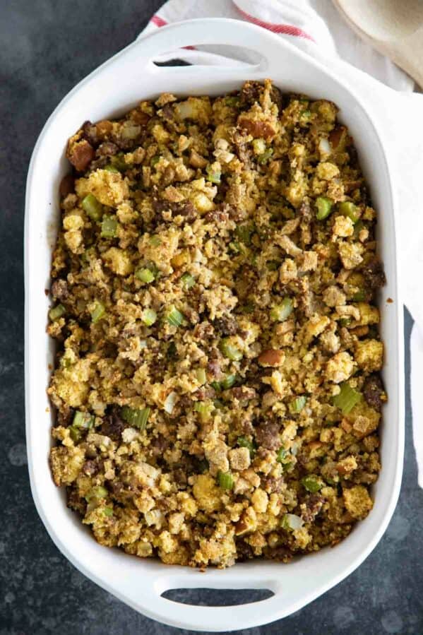 Casserole dish filled with Cornbread Stuffing with Sausage.