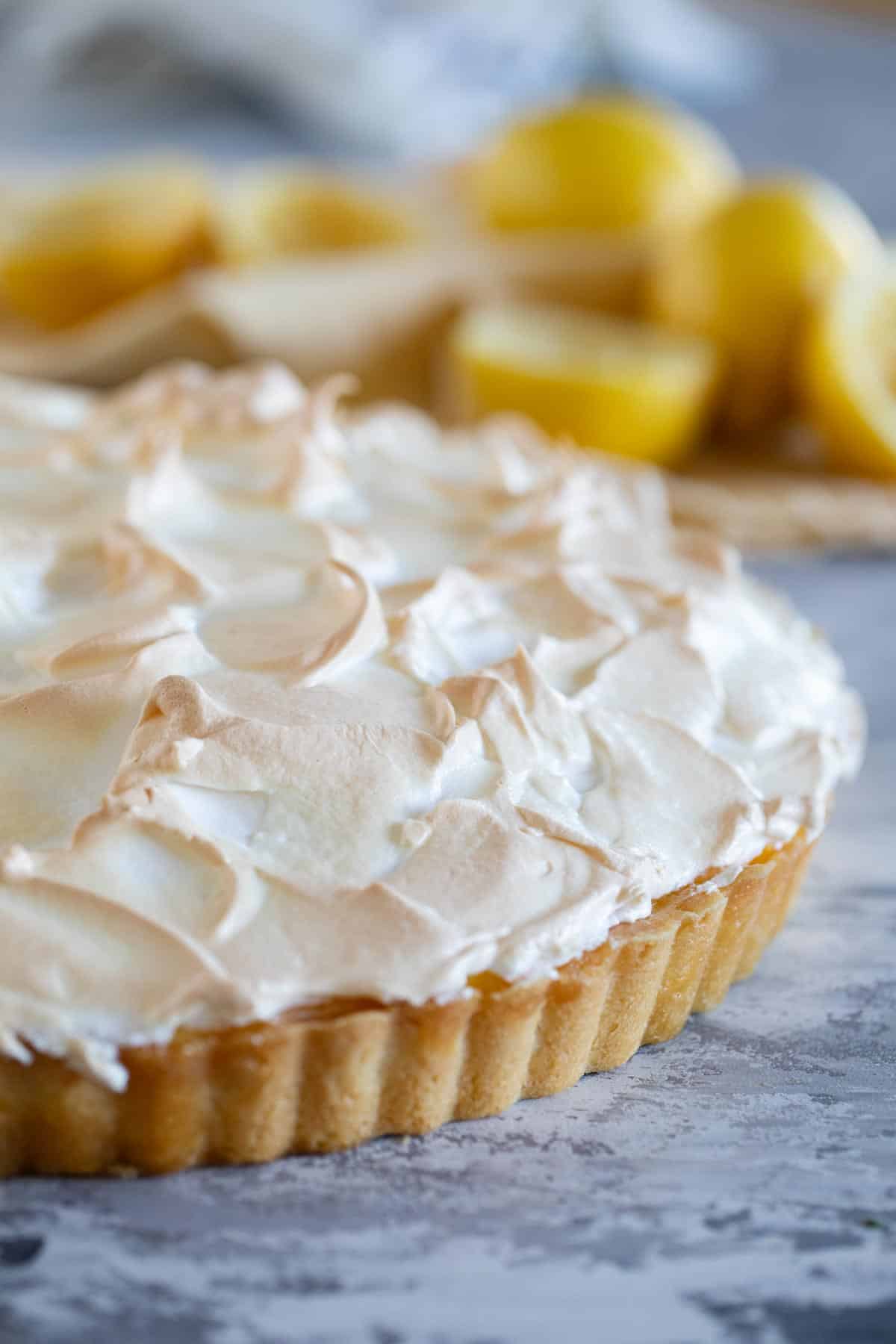 Full French Lemon Cream Tart topped with meringue.