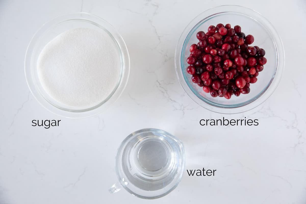 Ingredients to make sugared cranberries.