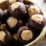 Peanut butter balls covered in chocolate - Buckeyes in a bowl.