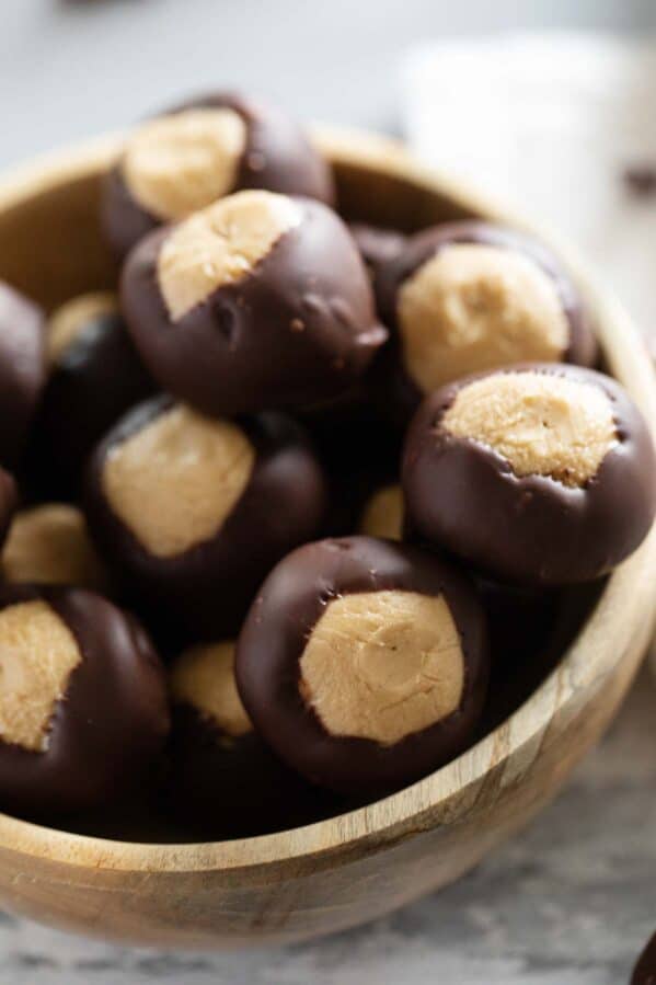 Peanut butter balls covered in chocolate - Buckeyes in a bowl.