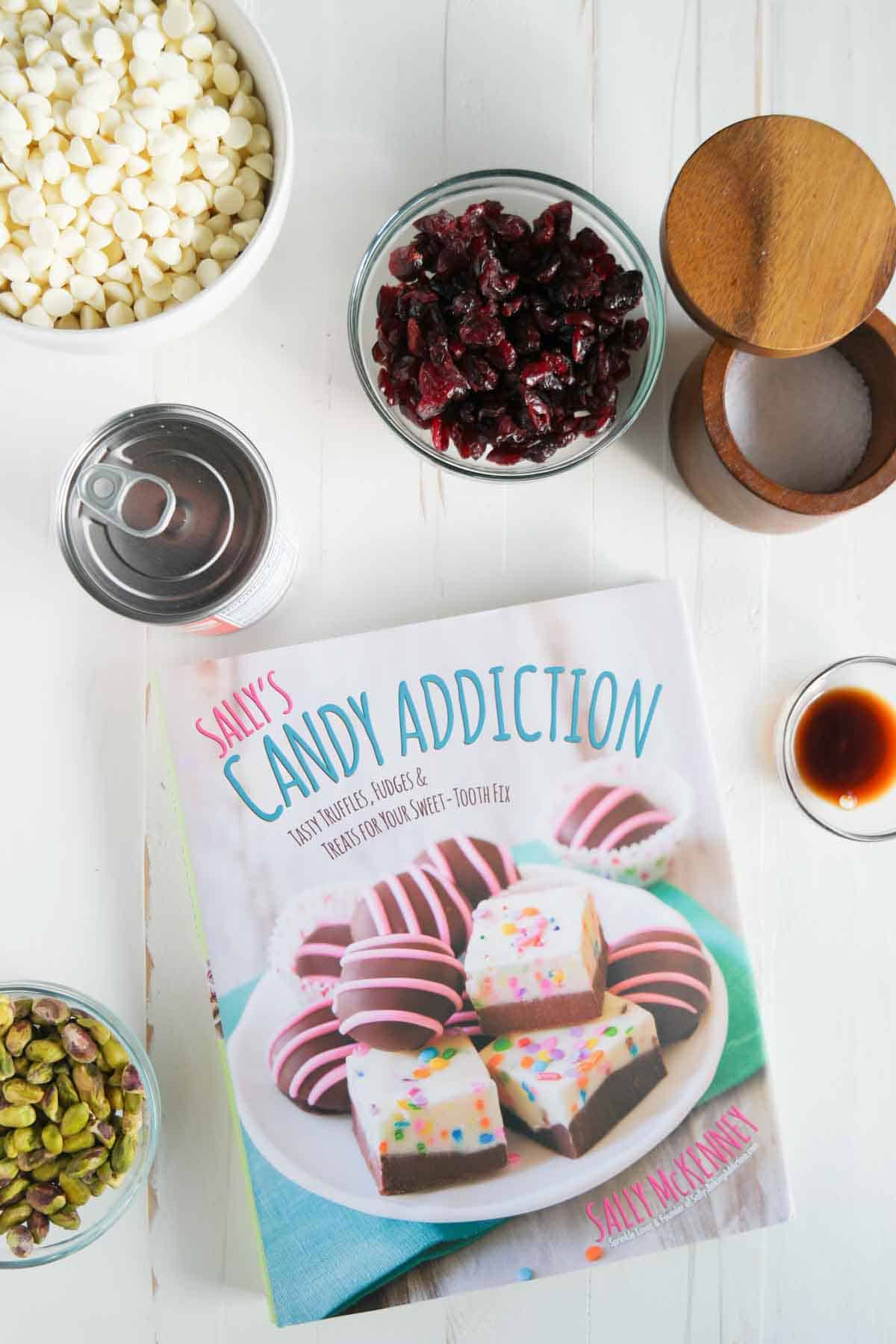 Fudge doesn’t have to be complicated or intimidating! This easy Creamy Cranberry Pistachio Fudge only takes minutes of hands on time, no candy thermometer, and only has 6 ingredients! Ingredients for cranberry pistachio fudge, plus a copy of Sally's Candy Addiction cookbook.