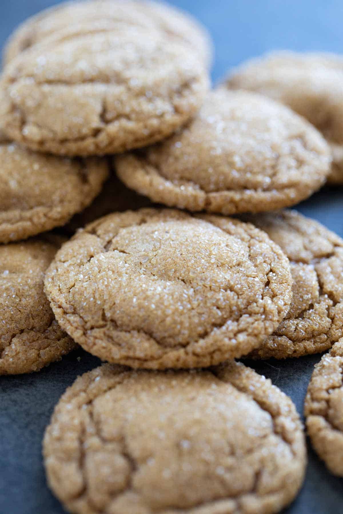 Stack of soft ginger cookies with sugar on the outsides.