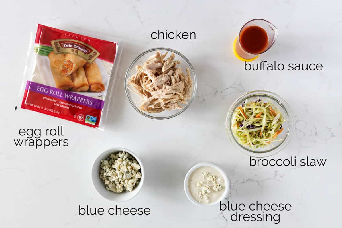 Ingredients to make buffalo chicken egg rolls.
