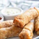 Buffalo chicken egg rolls with blue cheese dressing and extra buffalo sauce.