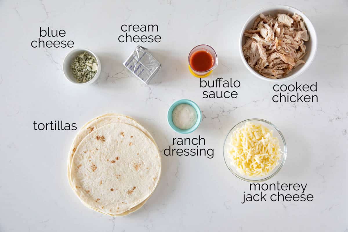 Perfect for the big game, or for a Friday night, any buffalo chicken lover will love these Buffalo Chicken Taquitos! Ingredients to make Buffalo Chicken Taquitos.