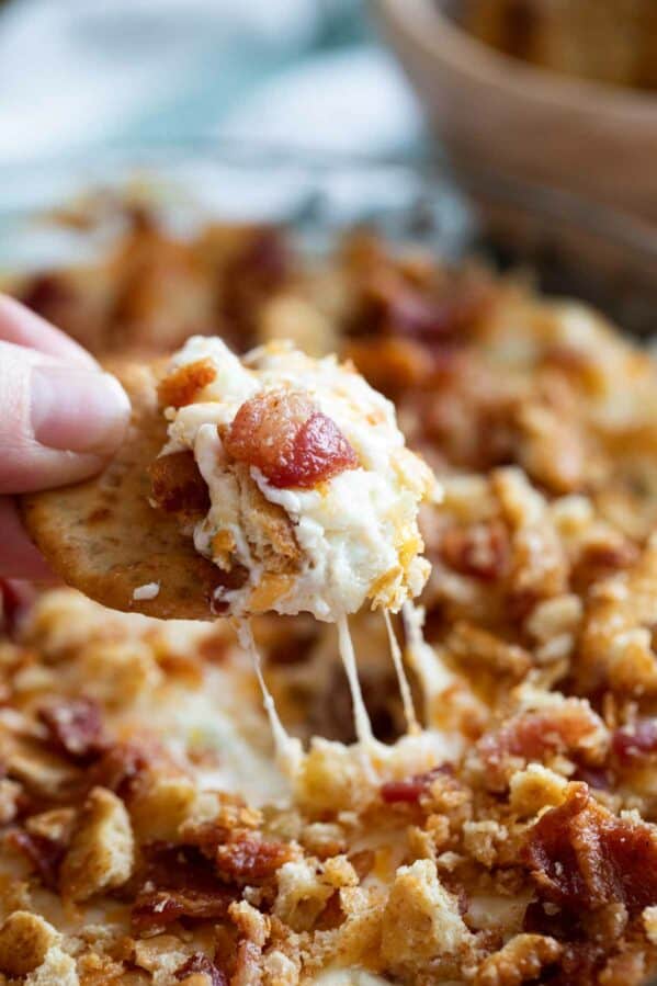 Cheesy Bacon dip on a cracker.