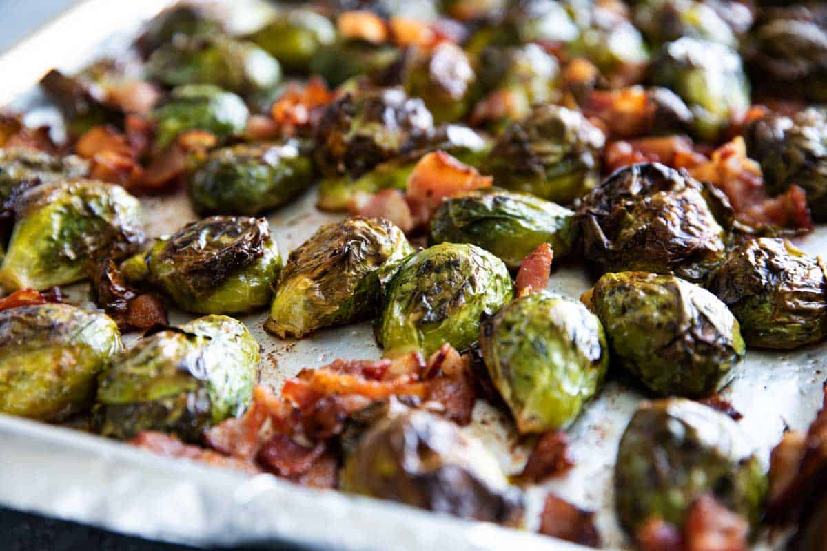 The tastiest - and easiest - way to prepare Brussels sprouts, these Roasted Brussels Sprouts are always a hit. They only take a few minutes to prepare, and everyone loves them. Roasted Brussels Sprouts on a baking sheet.