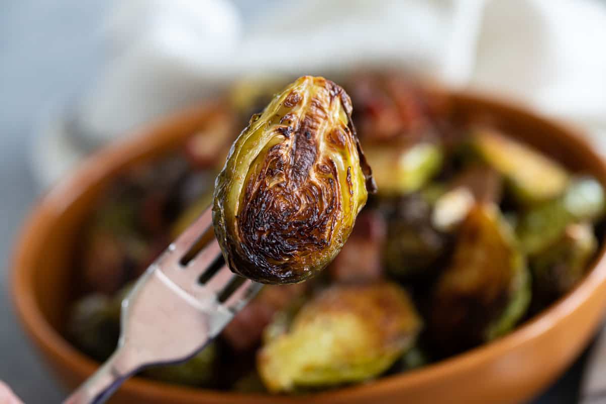 Brussel sprout half on a fork.