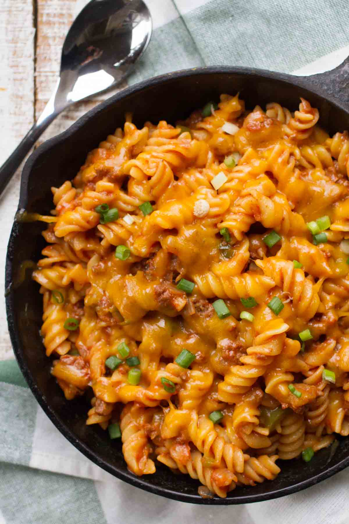 Sloppy joe pasta in a cast iron skillet.