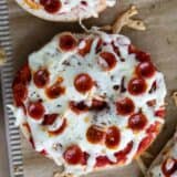 Pizza bagels with mini pepperoni.