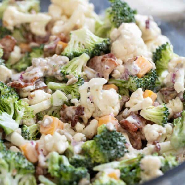 Broccoli Cauliflower Salad in a glass bowl.