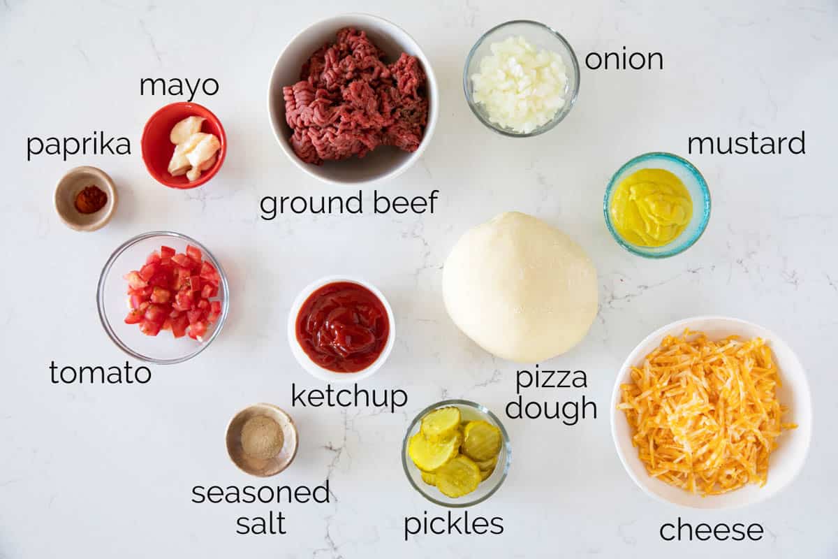 Looking for the ultimate mashup of two classic favorites? Try this Cheeseburger Pizza! This mouthwatering pizza combines all the delicious elements of a cheeseburger, including seasoned ground beef, melted cheese, an easy burger sauce, and tangy pickles, on a perfect pizza crust. Get ready for a taste explosion! Ingredients to make Cheeseburger Pizza.