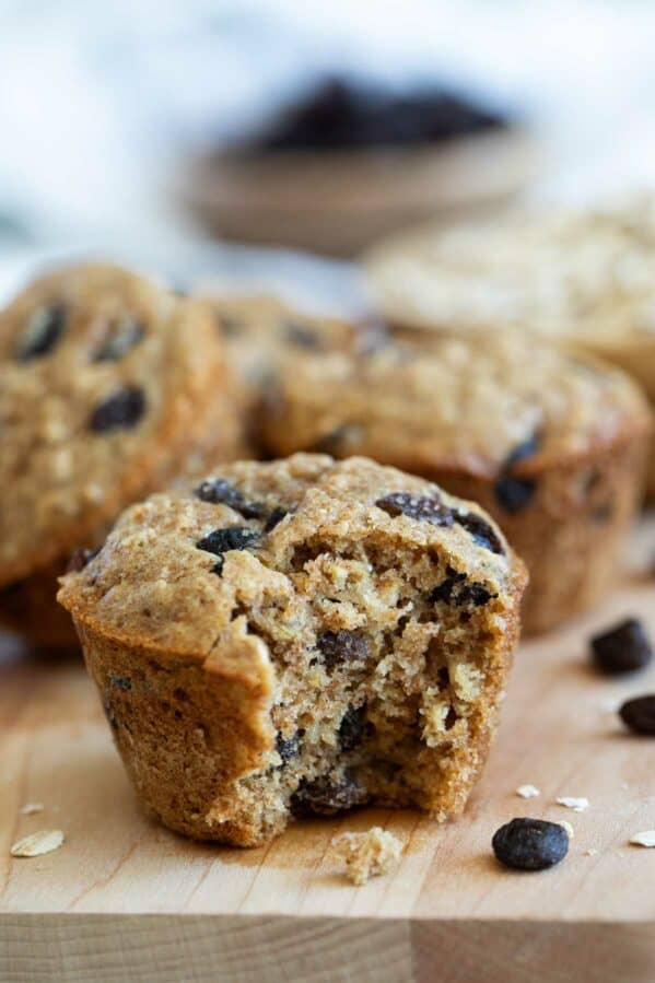 Oatmeal Raisin Muffin with a bite taken out of it.