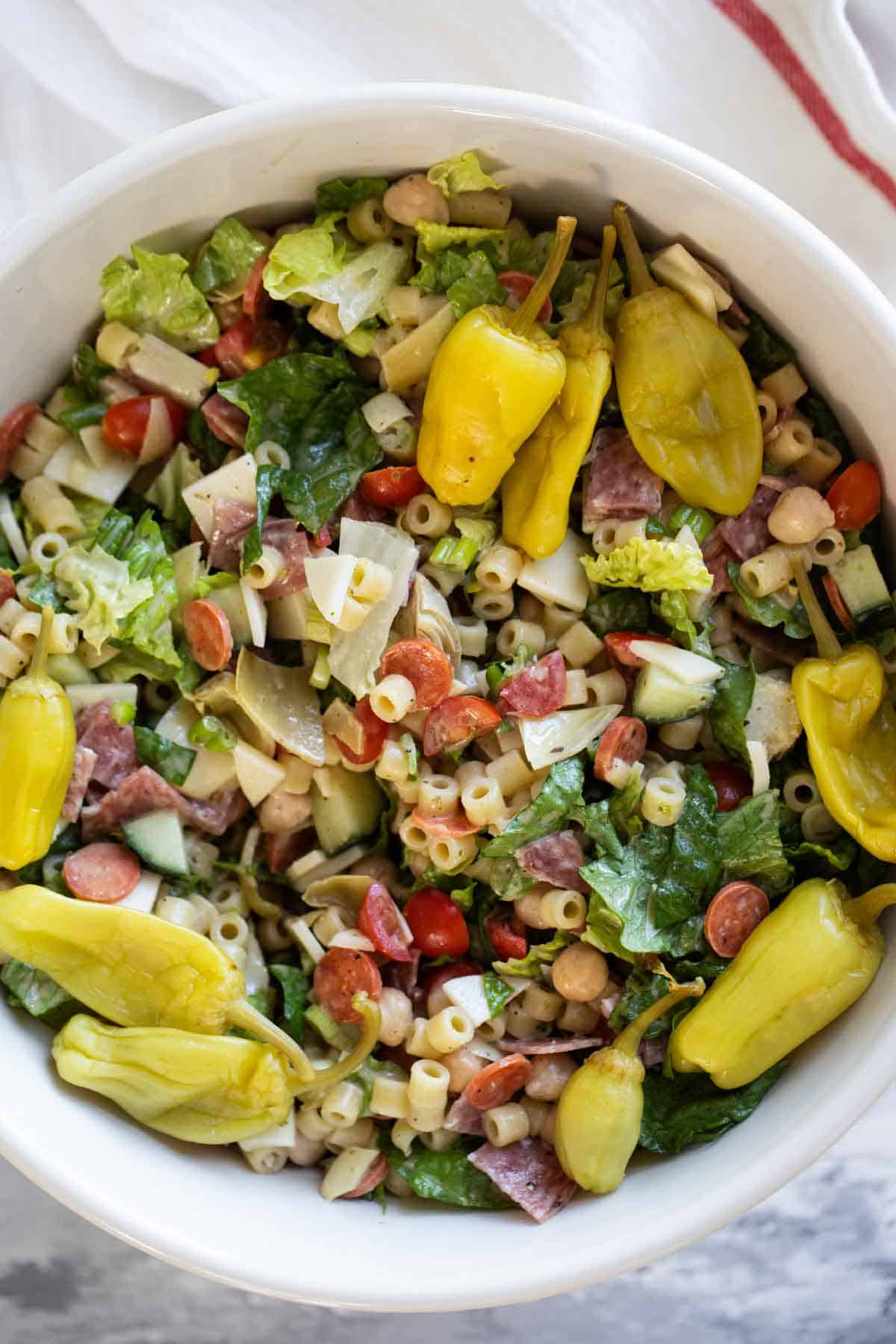 Italian Chopped Salad with pasta, meat, and cheese.