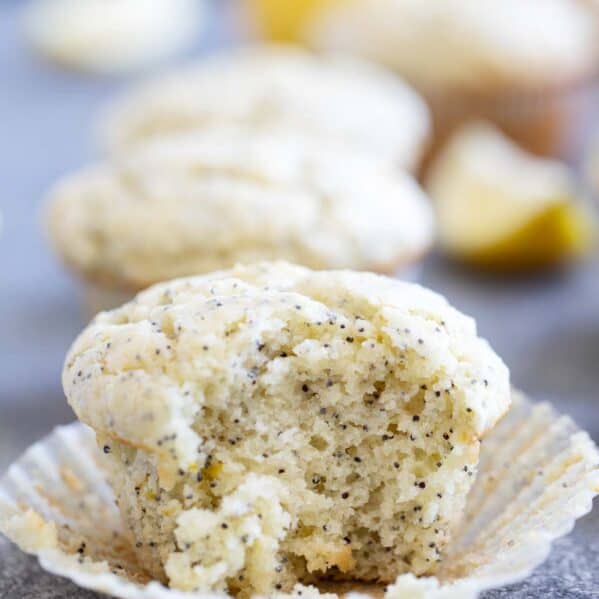 Lemon Poppy Seed Muffin with a bite taken from it.