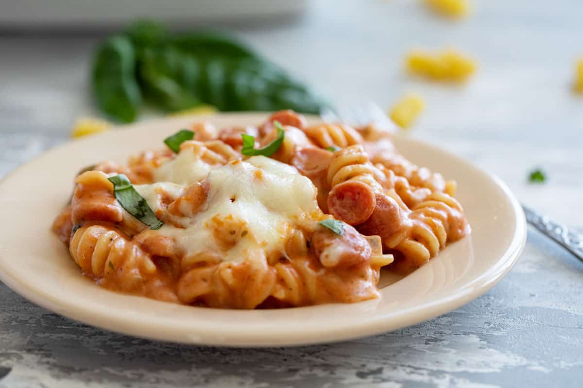 Plate with Pizza Pasta made with rotini pasta.