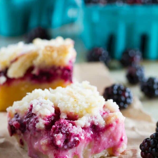 Blackberry pie bar on a piece of brown paper.