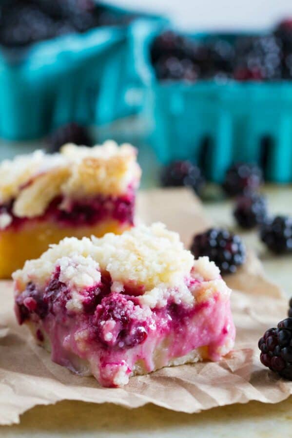 Blackberry pie bar on a piece of brown paper.