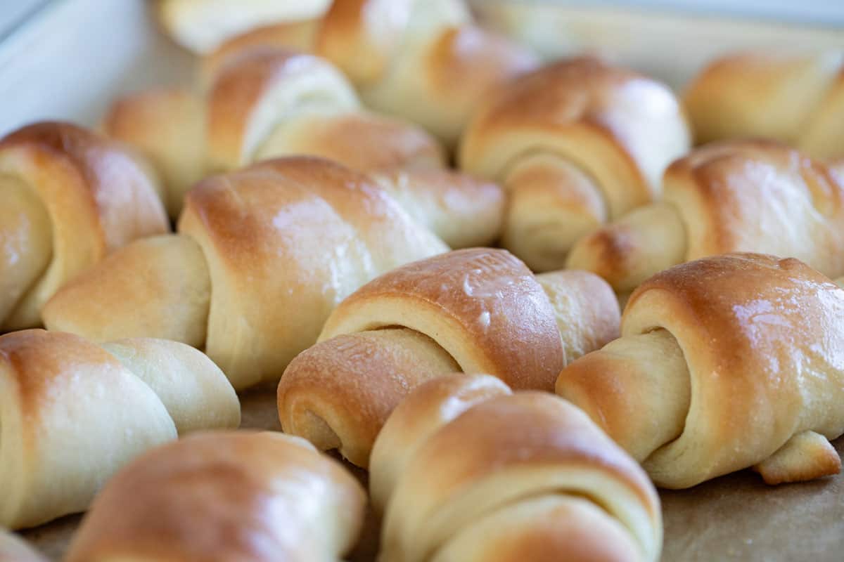 Finished butterhorn rolls brushed with butter.