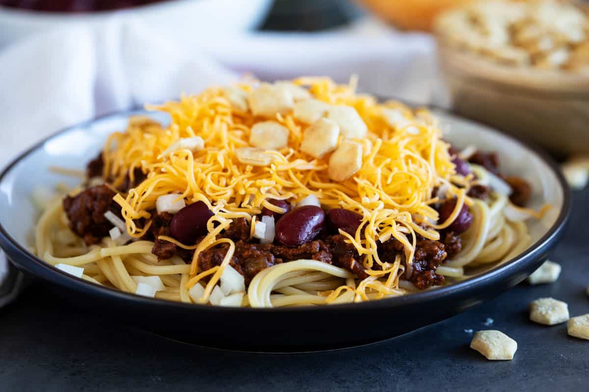 5-way Cincinnati Chili, spaghetti topped with chili, beans, onions, cheese, and oyster crackers.