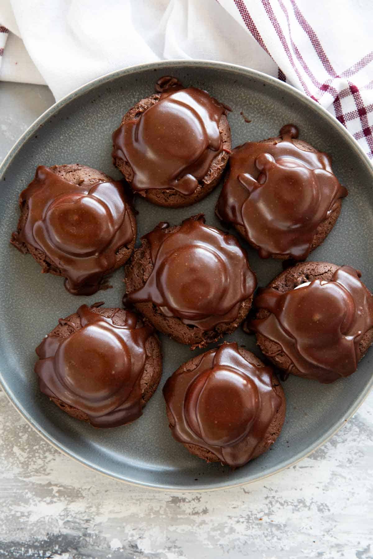 7 Chocolate Marshmallow Cookies on a gray plate.