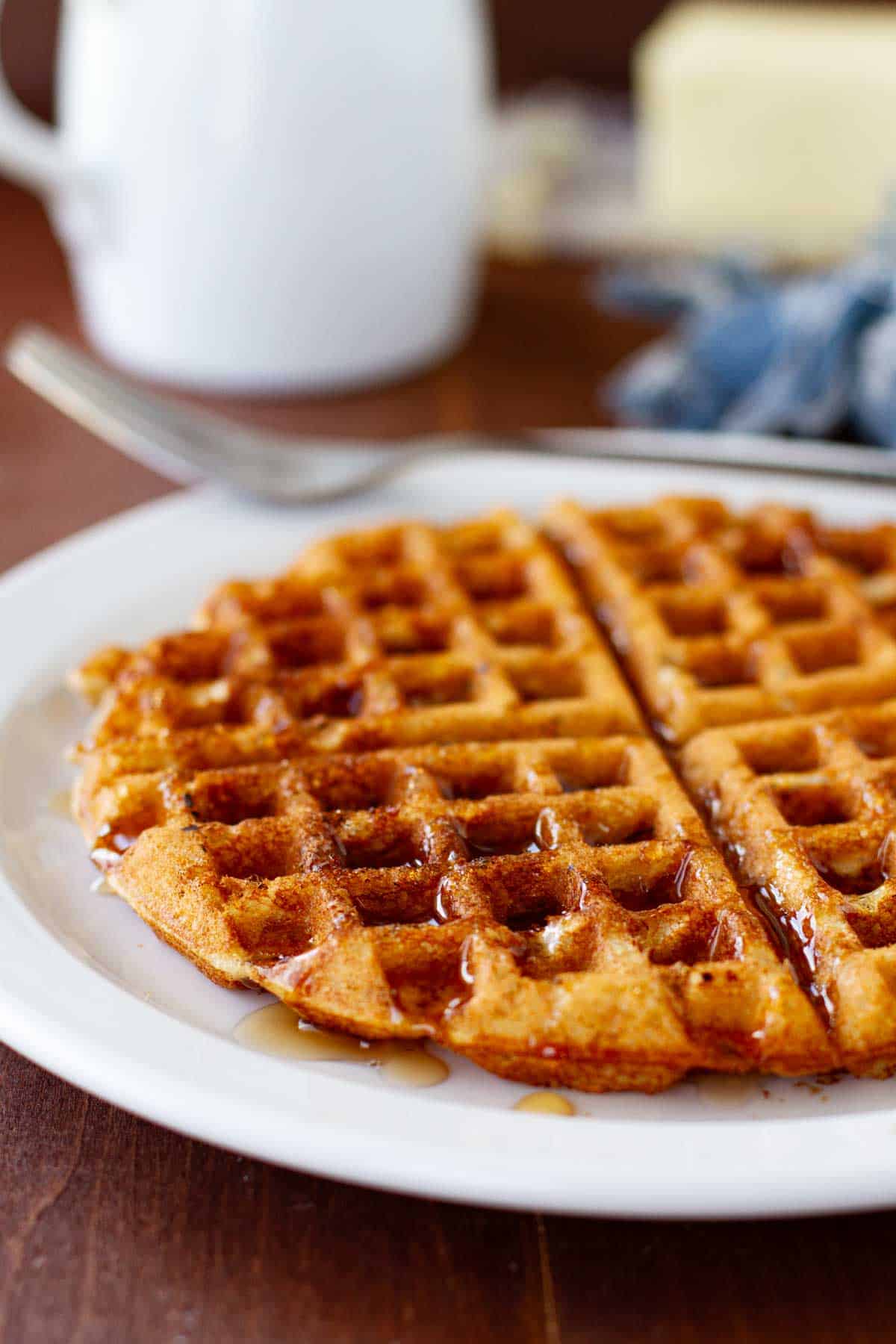 https://www.tasteandtellblog.com/wp-content/uploads/2023/12/Maple-Bacon-Waffles-1.jpg